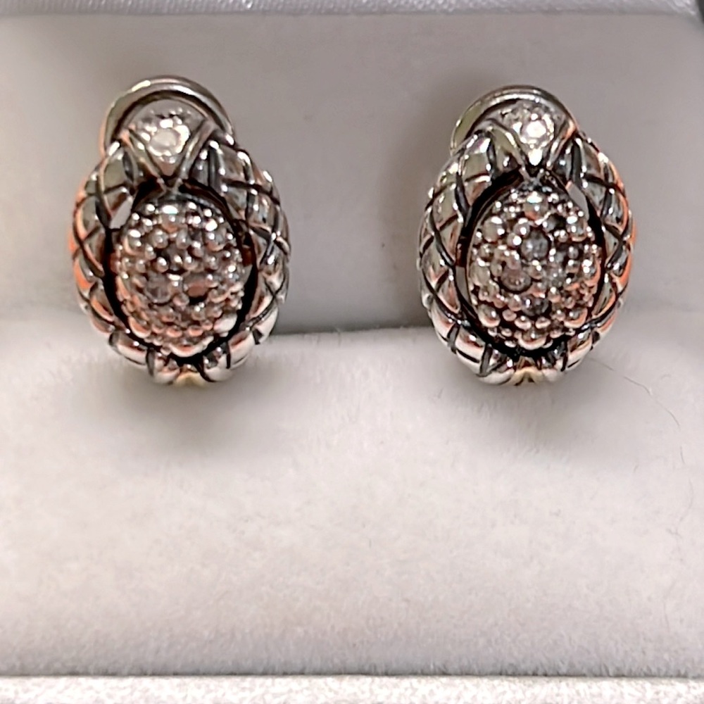 Sparkle in these Sterling Silver & Diamond Earrings.